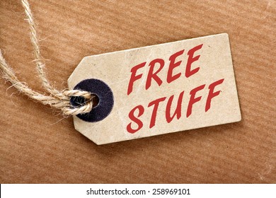 The phrase Free Stuff on a brown paper luggage tag on a brown wrapping paper background - Shutterstock ID 258969101