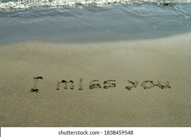 Phrase I Miss You Written On Beach Sand 