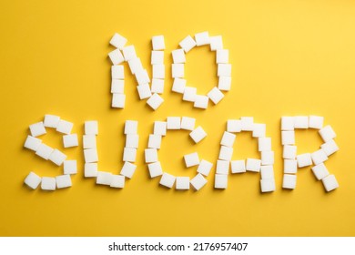 Phrase No Sugar Made Of Refined Cubes On Yellow Background, Flat Lay