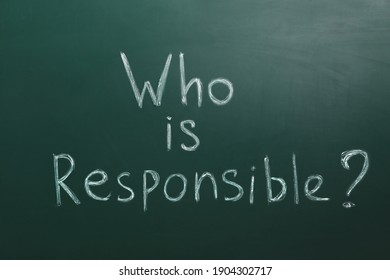 Phrase Who Is Responsible Written On Green Chalkboard