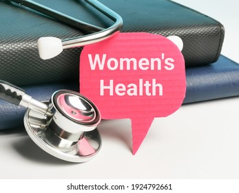Phrase WOMEN HEALTH written on bubble speech with stethoscope and books. Medical and health concept.