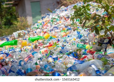 Phu Quoc Island, Vietnam - March 21, 2019:Pile Of Empty Plastic Bottle Waste And Beer Cans On Tropical Island In Vietnam. Typical Consumer Society Waste That Causes Permanent Damage To The Environment