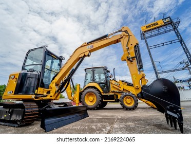 PHUKET, TAHAILAND - JUNE 05, 2022: Caterpillar Heavy Duty Equipment Vehicle On Display Area Of Dealership