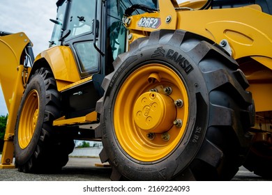 PHUKET, TAHAILAND - JUNE 05, 2022: Caterpillar Heavy Duty Equipment Vehicle On Display Area Of Dealership