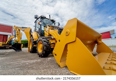 PHUKET, TAHAILAND - JUNE 05, 2022: Caterpillar Heavy Duty Equipment Vehicle On Display Area Of Dealership