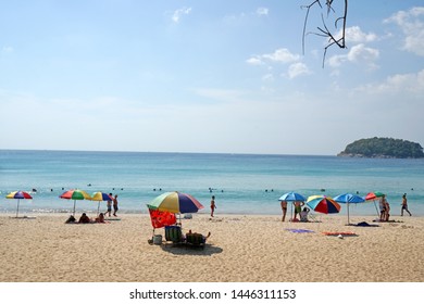 Phuket, Thailand - 12 January 2019 : Many tourist and Colorful beach umbrella on Kata Karon beach at  phuket thailand
