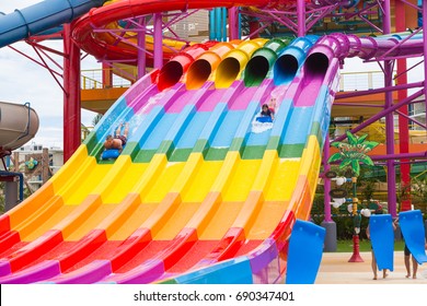 Phuket, Thailand - 8 July 2017 - Happy Vacationers Slide Down Giant Sliders At Splash Jungle Water Theme Park In Phuket, Thailand On July 8, 2017