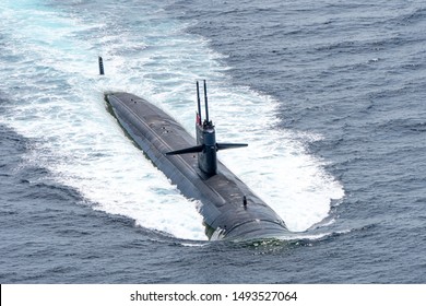 PHUKET, THAILAND - APRIL 9, 2018 : USS Louisville (SSN-724) fast attack submarine of U.S.Navy sails on the surface of the sea during Guardian Sea 2019 Exercise hold in Thailand.