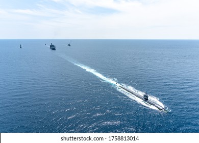 PHUKET, THAILAND - APRIL 9, 2018 : USS Louisville (SSN-724) Fast Attack Submarine Of U.S.Navy Sails In Front Of The Fleet During Guardian Sea 2019 Exercise.