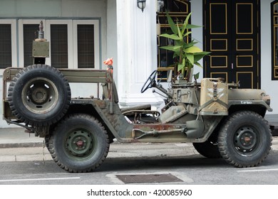 PHUKET THAILAND - AUGUST 10 2014 : Humvee Parking In Front Of Building