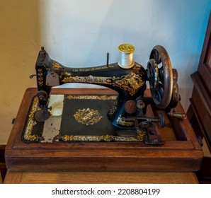 PHUKET, THAILAND - AUGUST 15, 2022: Vintage Singer Featherweight Sewing Machine 