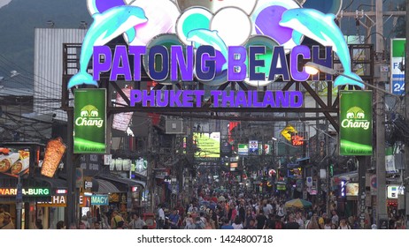 PHUKET – THAILAND, FEBRUARY 25, 2019, 4K Aerial view of crowded Patong Beach commercial road by night 
