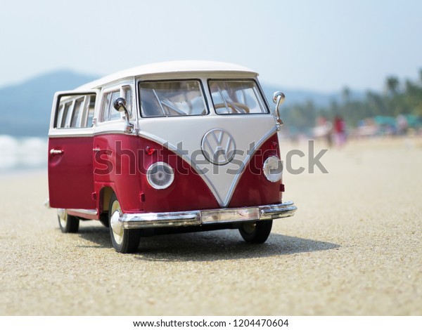 PHUKET, THAILAND - MARCH
27, 2015: Miniature VW Bulli 1962 on the beach. The cult car of the
Hippie generation and it remained the status vehicle of the high
wave surfers