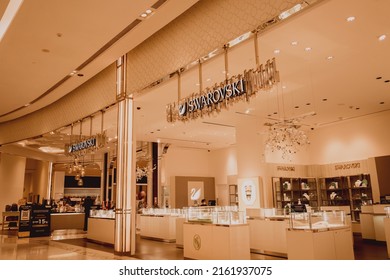 PHUKET, THAILAND - MAY 29, 2022: Swarovski brand retail shop logo signboard on the storefront in the shopping mall