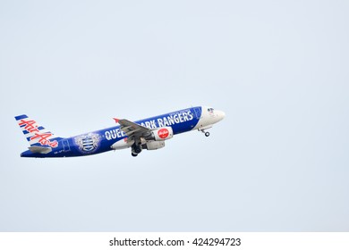 Phuket, Thailand - May 8,2016 :Malaysia Air Asia ,airbus A320 Queens Park Rangers Designed, 9M-AFV , Take Off At Phuket Airport