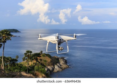 PHUKET, THAILAND - MAY 9 : Drone quadcopter Dji Phantom 4 Pro with 4K digital camera while flying over the sea in Phuket on May 9, 2017.
