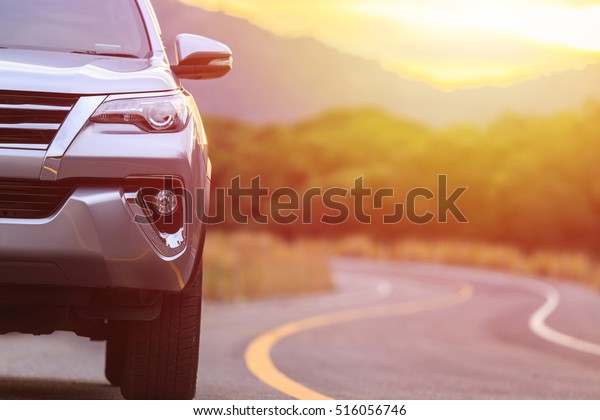PHUKET, THAILAND - NOVEMBER 3 : Private car, Toyota\
New Fortuner parking on the road in Phuket on November 3, 2016. The\
official dealer of Toyota, who is the top market share for\
commercial car.