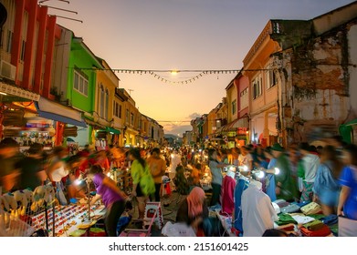 Phuket Walking Street night market in Phuket old town, Thailand. - Shutterstock ID 2151601425