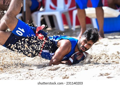 PHUKET,THAILAND-NOV14:Abdullah Dawoud Of Kuwait In Action During The  Beach Flag Football Kuwait And Thailand During The 2014 Asian Beach Games At Saphan Hin On NOVEMBER14,2014 In Thailand.
