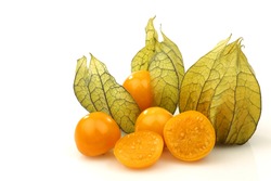 Physalis Fruit (Physalis Peruviana) And Some Cut Ones  On A White Background