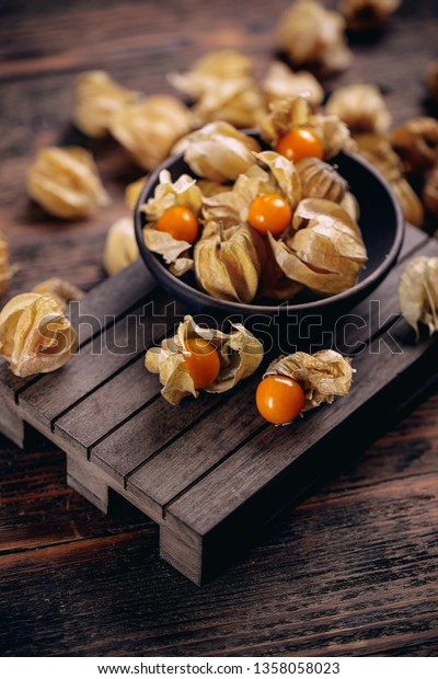 Physalis peruviana or cape\
gooseberry, goldenberry, poha, and physalis with calyx, exotic\
exported fruit