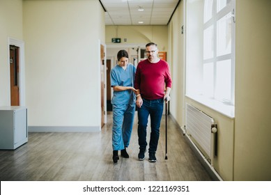 Physiatrist Training A Patient To Walk Again