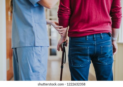 Physiatrist Training A Patient To Walk Again