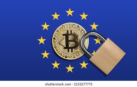Physical bitcoin with locker on EU flag. European cryptocurrency - Shutterstock ID 2153277775