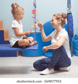 Physical And Mental Activities For A Kid During Sensory Integration Therapy