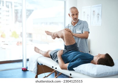 Physical therapist, client and man with leg injury, healing and consultation for rehabilitation. Male person, customer and chiropractor with physiotherapist, healthcare and wellness with stretching - Powered by Shutterstock