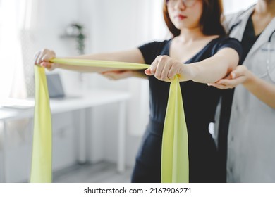 physical therapist Helping to heal and care for female patients physical therapy concept - Powered by Shutterstock