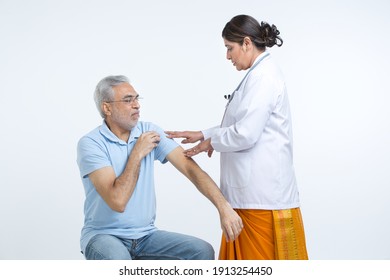 Physical Therapist Helping Old Man.