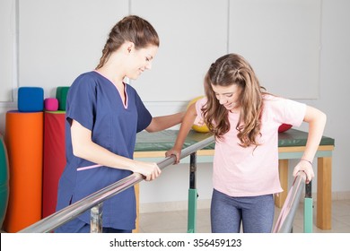  Physical Therapist With Patient In Rehabilitation