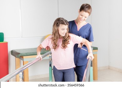  Physical Therapist With Patient In Rehabilitation