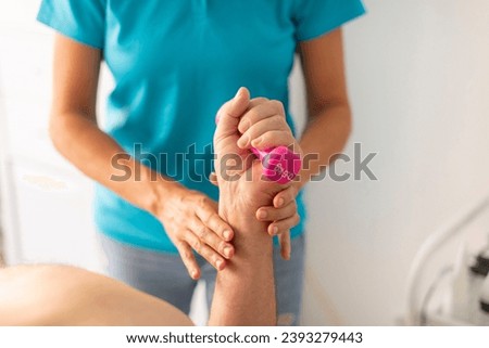 Image, Stock Photo A female physiotherapist performs stretches on the neck of her patient, an elderly man, to aid in his rehabilitation and wellbeing