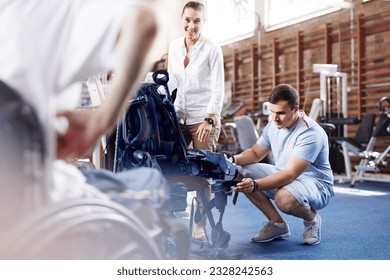 Physical therapists preparing equipment in clinic - Powered by Shutterstock