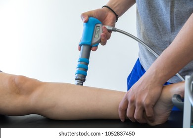 physical therapy of the knee and the foot with shock wave - Powered by Shutterstock