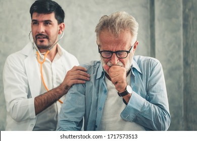 Physician Doctor is Examining Physical Health for Senior Patient in Medic Examination Room, Medical Doctor Using Stethoscope to Health Checkup for Elderly Old Man and Healthcare Treatment Consulting. - Powered by Shutterstock