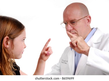 Physician Giving Young Girl Eye Tracking Exam