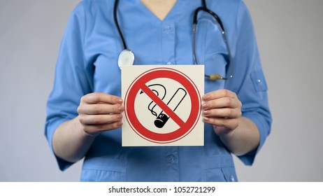 Physician Showing No Smoking Sign, Specialist Warning About Harm Of Tobacco Use