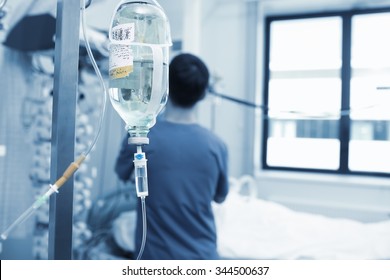 Physician works with critically ill patient in hospital - Shutterstock ID 344500637