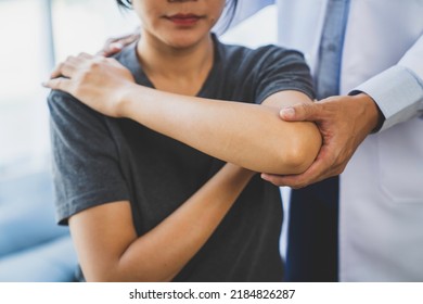 Physicians Consulting Patients About Elbow Muscle Pain Problem, Office Syndrome Problems, Physiotherapy Diagnosis Concept