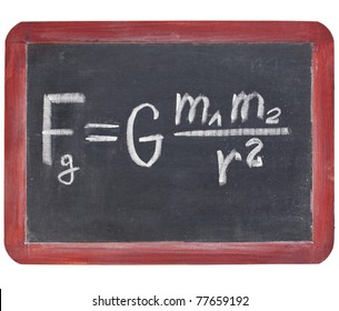 Physics Education Concept - Newton Gravity Law On A Small Slate Blackboard