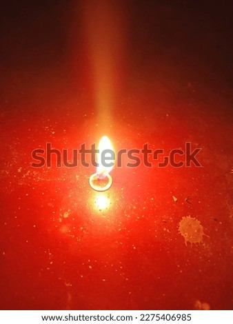 Physics An obsolete unit of luminous intensity, originally defined in terms of a wax candle with standard composition, later in terms of a carbon-filament lamp, and superseded by the candela. 