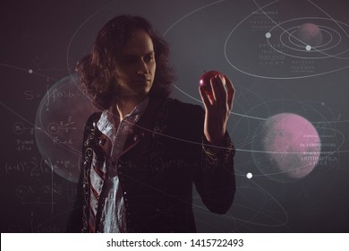 Physics the science of nature, the concept of studying the laws of nature. A young man in the image of Isaac Newton. With an Apple in hand, the concept of the laws of gravity.