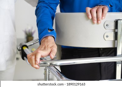 Physiotherapist assisting a patient with Amyotrophic Lateral Sclerosis. High quality photo - Powered by Shutterstock