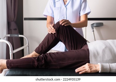 Physiotherapist Doing Treatment To Senior Women Patient At Hospital,Elderly Woman Knee Pain,Physical Therapy Concept