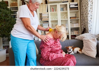 Physiotherapist Gives Senior Citizens A Neck Massage With A Massage Ball Against Tension