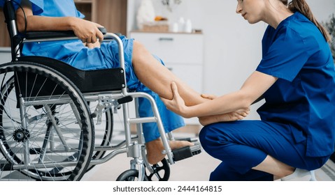 Physiotherapist helping elderly man patient stretching arm during exercise correct with dumbbell in hand during training hand with patient Back problems in clinic 
 - Powered by Shutterstock