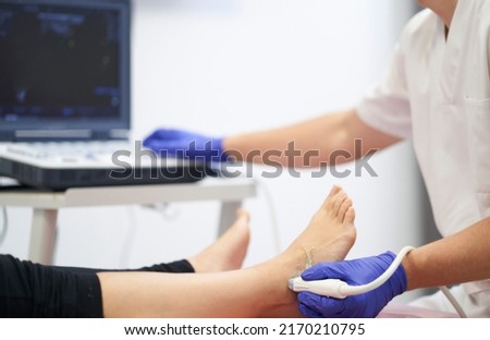 Similar – Image, Stock Photo A physiotherapist performs a facial acupuncture session on her patient to tone the muscles of the face